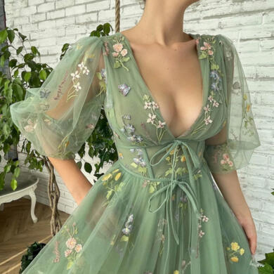 photo of a dress by Teuta Matoshi, the Flourishing Meadow Midi Dress